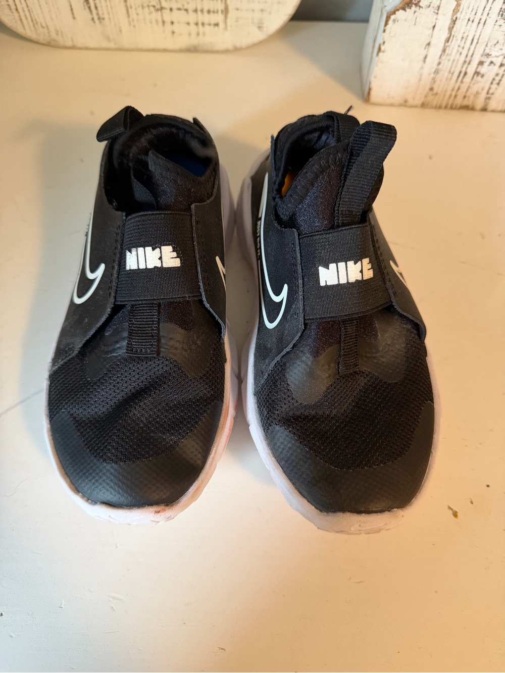 Nike Kids Black and White Slip-On Sneakers